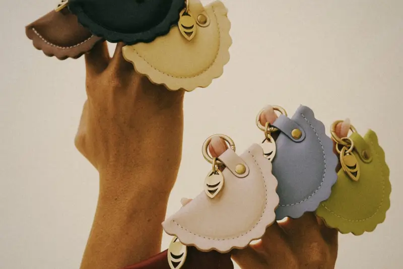 Ravioli-shaped leather bag charms in soft colours